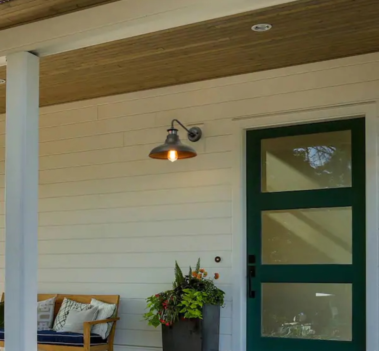 Cattleya 1-Light Matte Black Motion Sensing Dusk-To-Dawn Outdoor Wall Lantern Scone